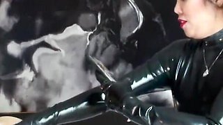 Latex Asian Dominatrix Pegging Slave
