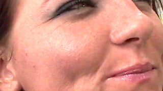 Brunette cutie gets nailed on the sofa by a black hunk doggy style