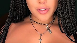 Busty babe playing with her big boobs