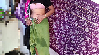 The father-in-law is secretly watching the Indian daughter-in-law cleaning the house in a petticoat, blouse, bra, daughter-in-law is fingering her pussy, yearning for a cock.