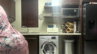 Ebony MILF Moaning and Stripteasing in Kitchen