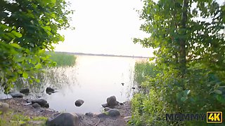 Malusha, the busty Russian cougar, seduces and fucks a guy with a huge cock in a park