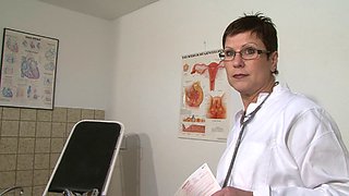 Mature European doctor dildoing her old cunt in the hospital