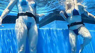 Beautiful milf Lory Lace has an underwater pool sex with a young and hung stud.