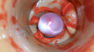 The camera inside the deep pussy records a huge ejaculation with a stuck condom 4k
