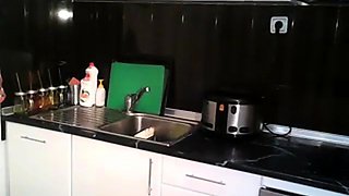 british cam-slut cleans the kitchen