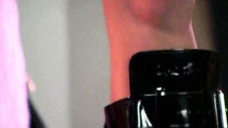 Impressive latex doll Linsey Dawn McKenzie shows off her natural tits