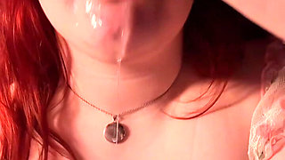 Curvy Redhead Gives a Black Dildo a Sloppy Blowjob