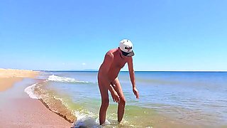 Nudist Couple Having Pegging Session On The Beach