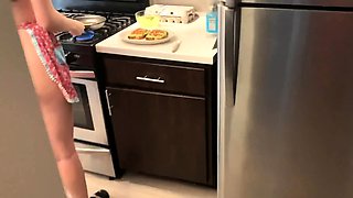 Mesmerizing brunette sucking off a big cock in the kitchen