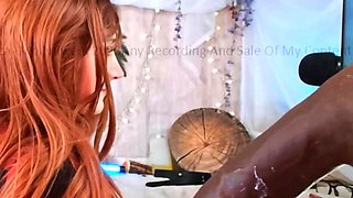 Redheaded amateur MILF with a sex toy on webcam show