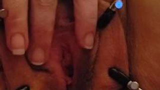 Wife spread with pussy clamps in slow motion