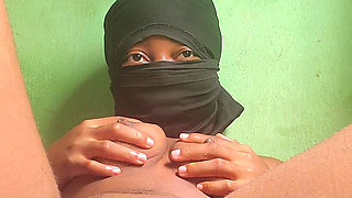 Naughty African babe touching and fingering herself when she is  alone