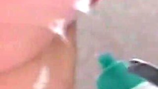 Chubby old woman uses toilet brush to masturbate