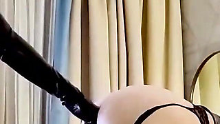Latex Sissy pegged by Filipina Dominatrix