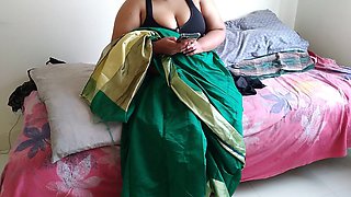 Telugu Aunty in Green Saree with Huge Boobs on Bed and Fucks Neighbor While Watching Porn on Mobile - Huge Cumshot