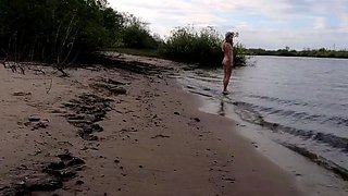 Exhibitionist Blonde Goes Nude on a River Beach
