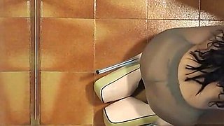 MILF in Pantyhose and High Heels Gives a Blowjob on Her Knees with Cum Swallowing