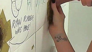 Wild Tattooed Slut Takes on a Blowbang Session Down at the Gloryhole