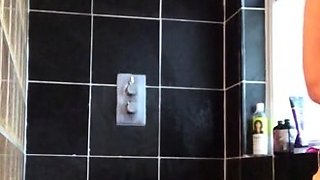 Pussy rubbing babe goes solo in shower play in hd