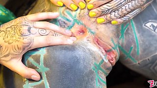 Two tattooed babes get their holes gaped wide with big toys
