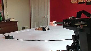 Excellent looking gal in footwear with high stilettos is using a boink machine to make herself jizm