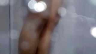A very handsome young man starts taking a shower in the hotel, really nice with his big cock and body.