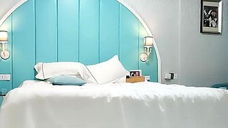 Cute amateur asian web cam girl playing with her toy