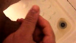 Masturbating and wanking my hard cut cock under the shower