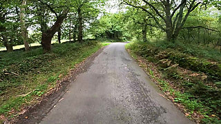 I see a girl cycling in the woods and when I go to urinate she helps me by giving me a blowjob in public