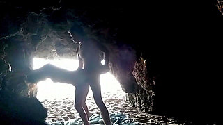 Couple recorded at the beach, inside the cave