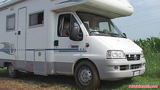 She Sucks His Cock While Driving and Then Gets Fucked in the Camper