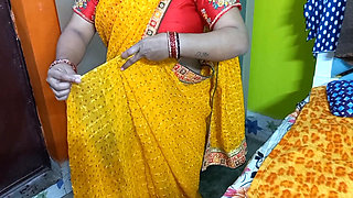 Beautiful Indian bhabhi having wearing a saree.