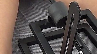 A Mature MILF Masturbates with a Sex Machine