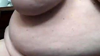 busty granny fucks herself with a dildo