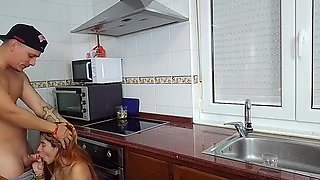 Sexy latina redhead gives me a blowjob and spreads her legs, inviting me to pound her pussy in this horny kitchen encounter