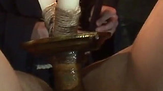 Witch Hangs Upside Down and Gets Drizzled with Black Wax