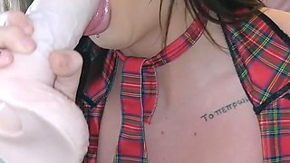 Brunette enjoys the toy on gaping pussy while masturbating