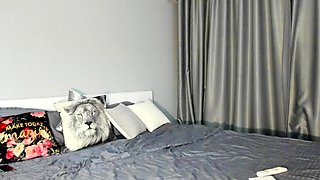 Amateur young brunette enjoys dildo on solo masturbation