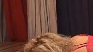 Blonde Bombshell Dominates and Rides Hooded Stud Wildly