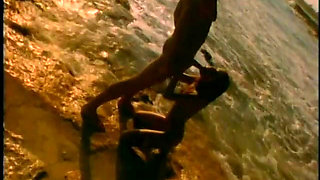 Lusty Brunette Rides a Long Hard Cock in the Ocean