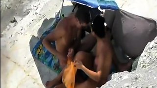Peeking at stepdaughter and BF on beach