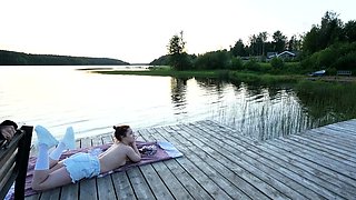 Hot outdoor threesome with two wild and horny young babes