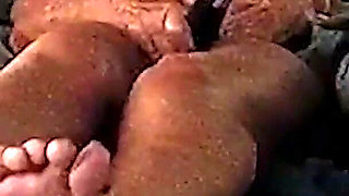 Auntie Ann Plays with Pussy While Giving Footjob