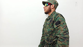 A Doctor Sensually Gropes a Soldier in the Doctor's Office During a Consultation