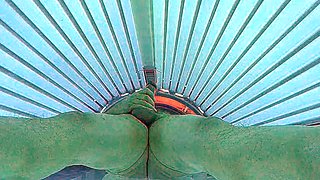 Masturbating in public tanning bed
