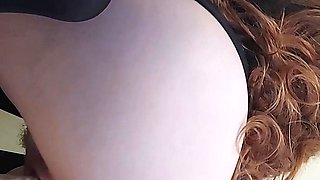 Beautiful redhead uses toy to masturbate