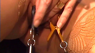 Mature Brunette MILF Bound with Weighted Nipple Clamps