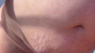 Sexy MILF naked on the boat