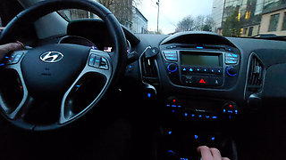 Amateur MILF gives a handjob to a taxi driver and teases him in the car, in public